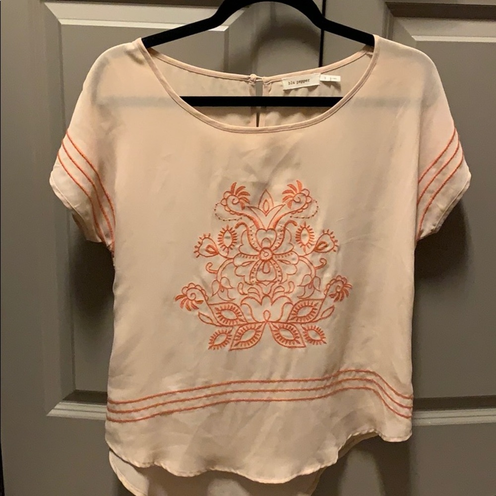 Cream/orange blouse
